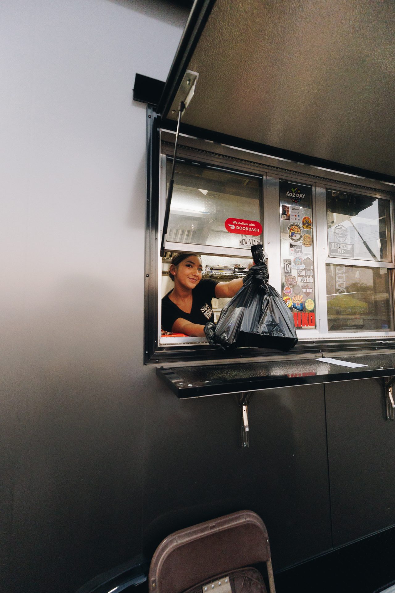 Serving fresh BBQ from the HNDZ food truck window